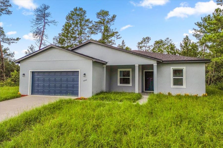 Front exterior of a new home in , Ocala, FL, highlighting curb appeal (Image 19). Front exterior of a new home in , Ocala, FL, highlighting curb appeal (Image 19).