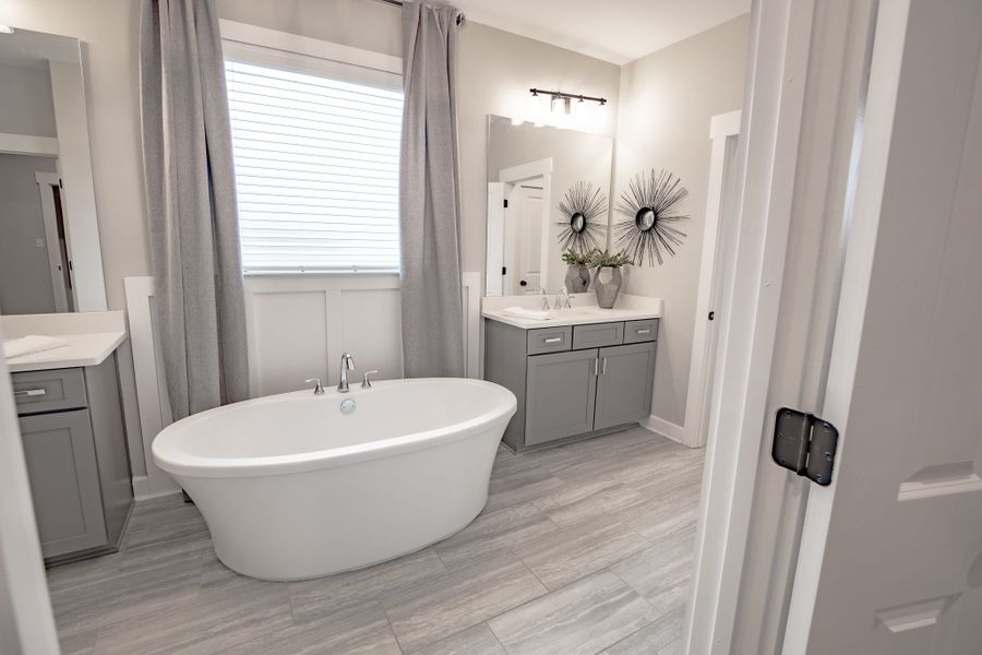 Representative furnished interior of a home built from the Willow by Grant & Co in Manor at Hall Creek, Arlington (Image 51).
