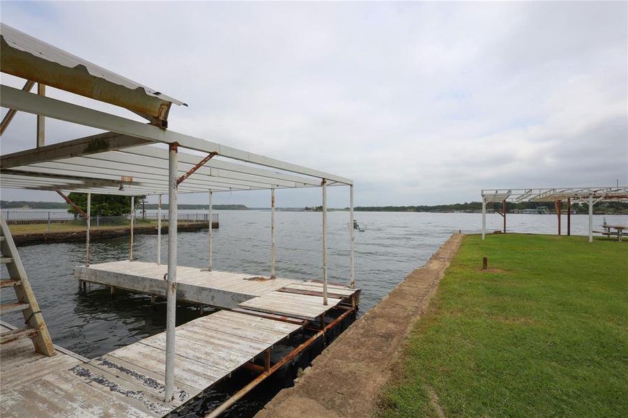Dock area with a water view and PENISULA Dock area with a water view and PENISULA