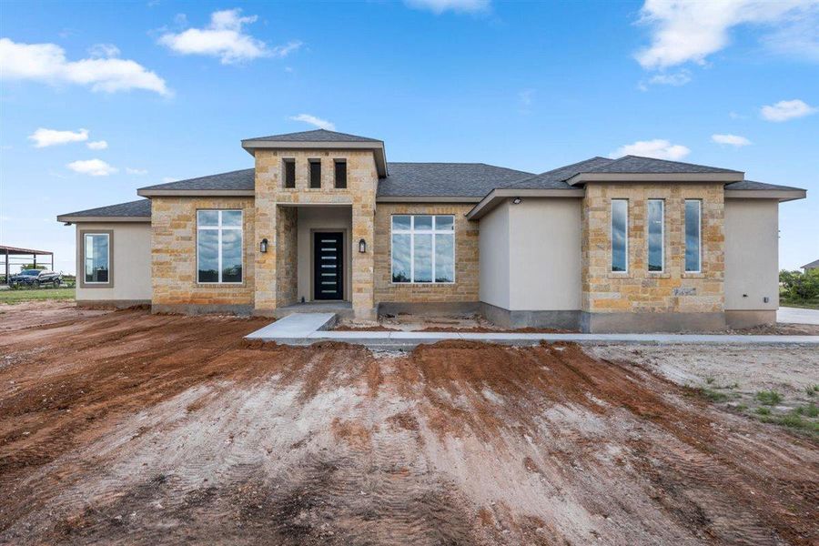 In-progress construction of a new home in , Bertram, TX (Image 35).