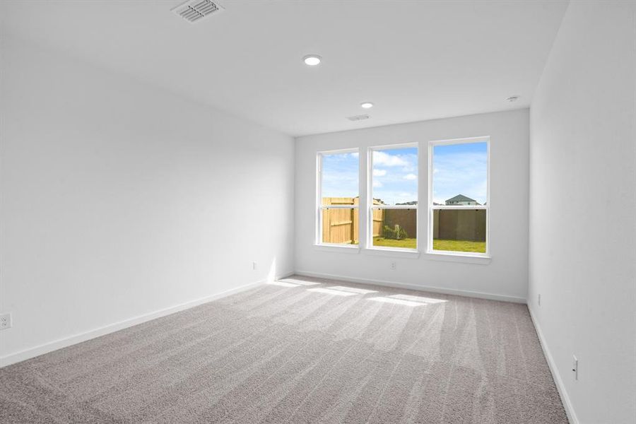 *REPRESENTATIONAL PHOTO* Formal Dining Overlooking the Wall of Windows