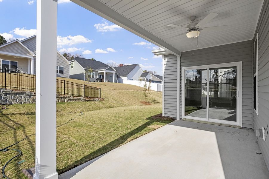 Exterior details and patio area of a home in Renaissance at White Oak, Garner (Image 3).