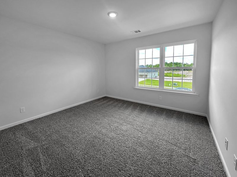 Spacious, unfurnished interior of a new home in Doctor's Creek, Ludowici (Image 18).