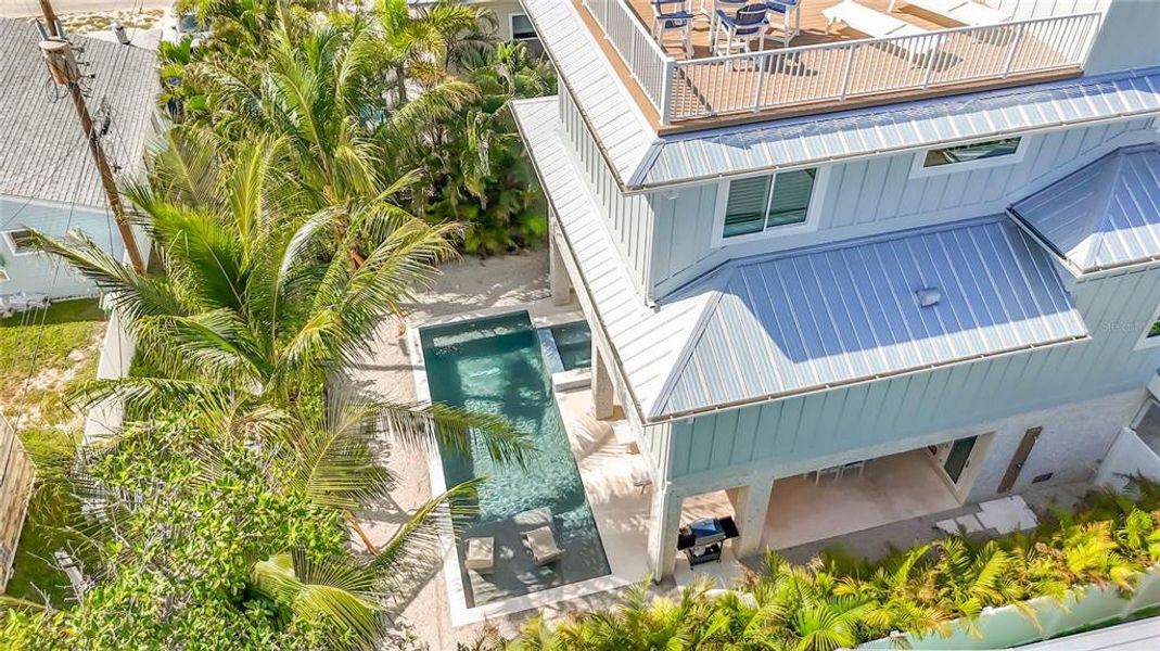 Exterior details and patio area of a home in , Bradenton Beach (Image 40).