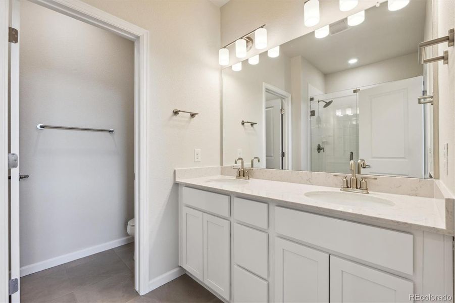 Furnished interior view inside a new home in Townhome Collection at Grand Vue at Interlocken, Broomfield (Image 6).