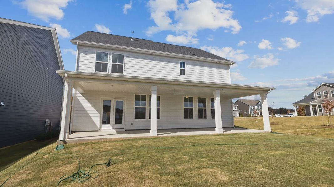 Burton Design large rear covered porch at Lakeside Glen by premier builder DRB Homes in York, SC. Burton Design large rear covered porch at Lakeside Glen by premier builder DRB Homes in York, SC.