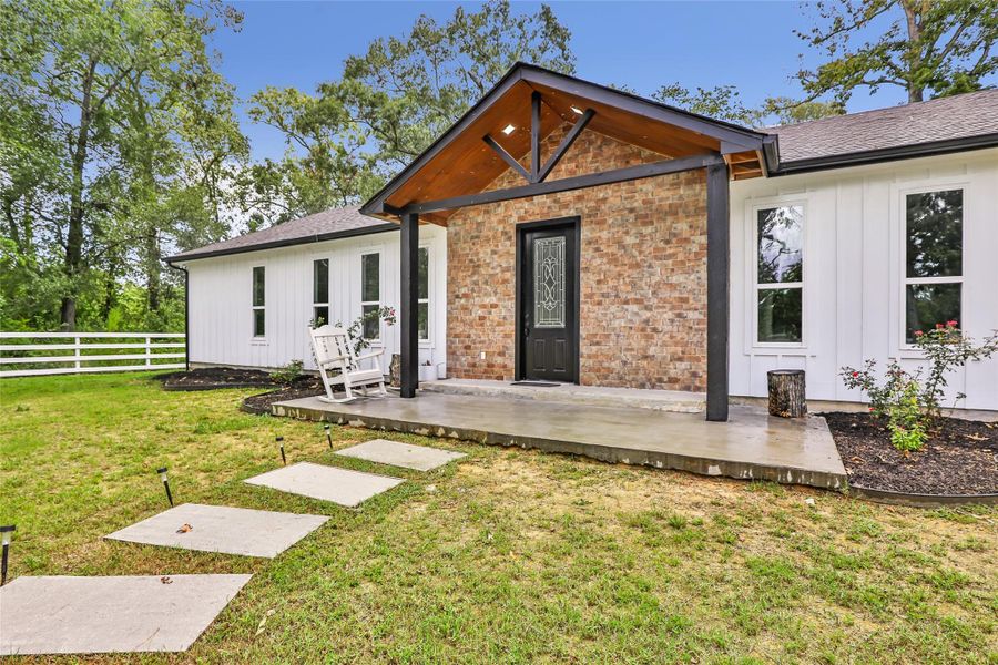 Front exterior of a new home in , Dayton, TX, highlighting curb appeal (Image 16). Front exterior of a new home in , Dayton, TX, highlighting curb appeal (Image 16).