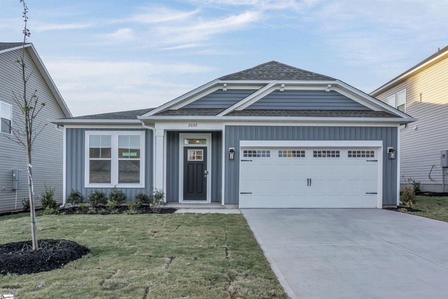 Front exterior of a new home in Halton Oaks, Spartanburg, SC, highlighting curb appeal (Image 2). Front exterior of a new home in Halton Oaks, Spartanburg, SC, highlighting curb appeal (Image 2).