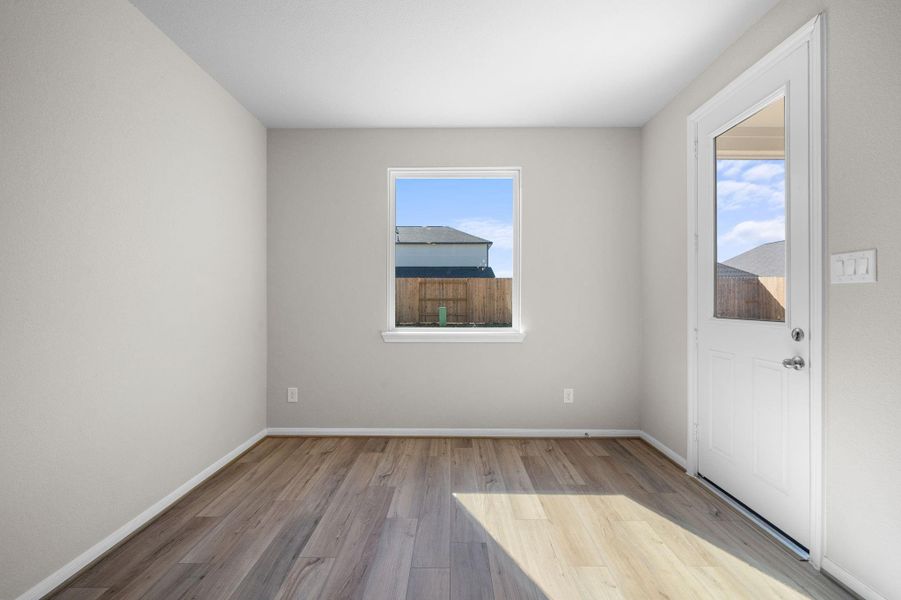 The dining area is a perfect blend of style and functionality, providing an inviting space for memorable meals and gatherings.