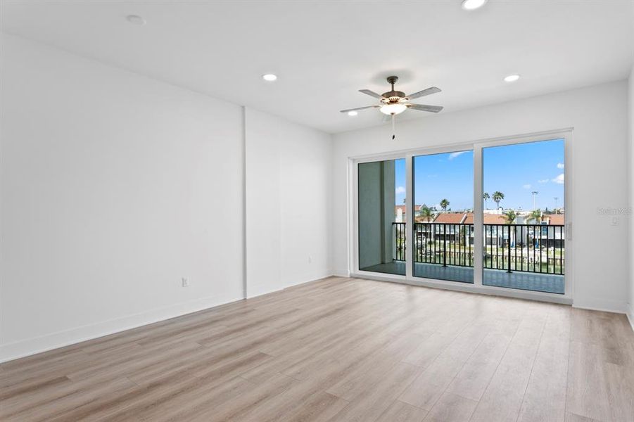 Spacious, unfurnished interior of a new home in Residences at Town Center, Madeira Beach (Image 38).