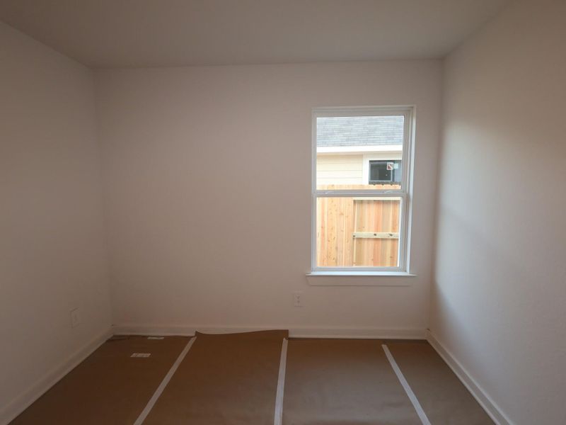 In-progress construction of a new home in Pinewood at Grand Texas, New Caney, TX (Image 12).