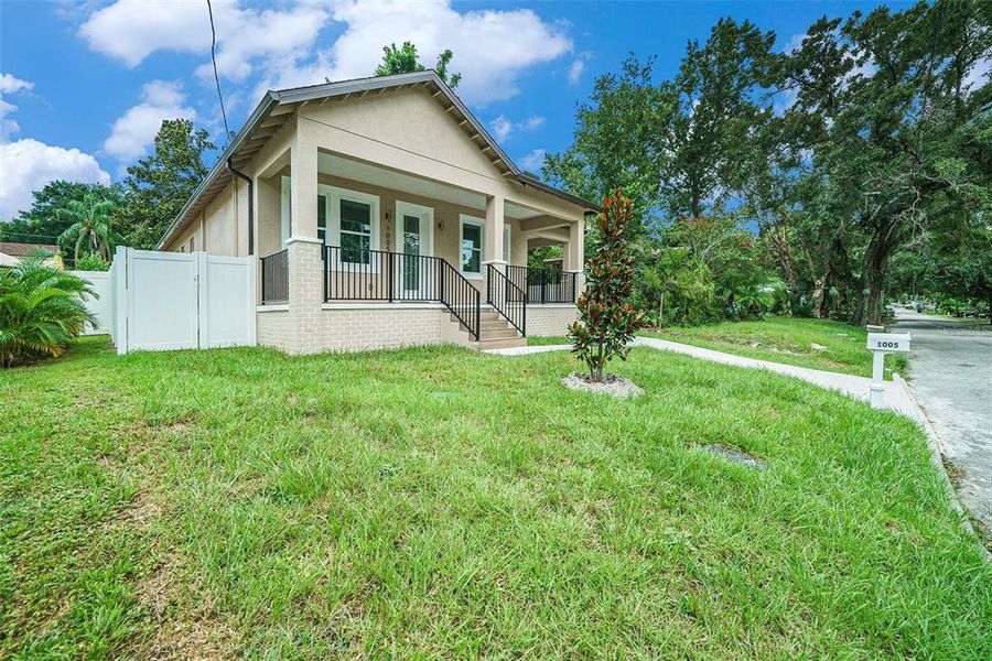 Front exterior of a new home in , Tampa, FL, highlighting curb appeal (Image 17). Front exterior of a new home in , Tampa, FL, highlighting curb appeal (Image 17).