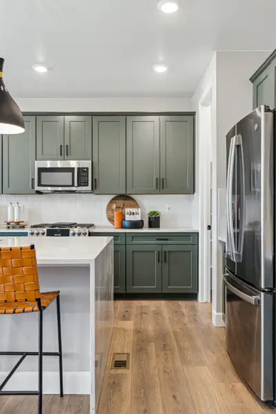 Furnished interior view inside a new home in Trailstone, Arvada (Image 10).