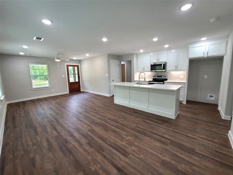 Open concept living and dining area