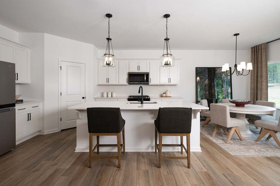 Representative furnished interior of a home built from the Hampstead by Ashton Woods in The Pointe at Heron Bay, Locust Grove (Image 3). Representative furnished interior of a home built from the Hampstead by Ashton Woods in The Pointe at Heron Bay, Locust Grove (Image 3).