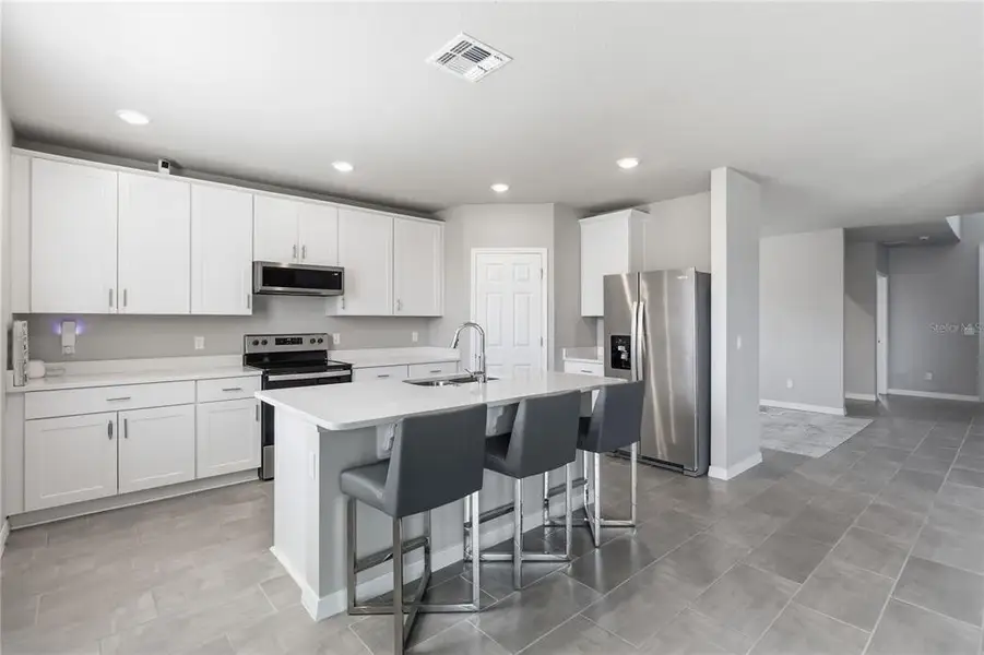 Furnished interior view inside a new home in Silver Springs, St. Cloud (Image 9). Furnished interior view inside a new home in Silver Springs, St. Cloud (Image 9).