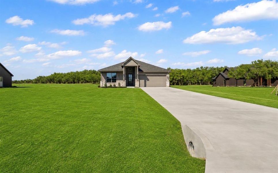 Front exterior of a new home in , Millsap, TX, highlighting curb appeal (Image 16).