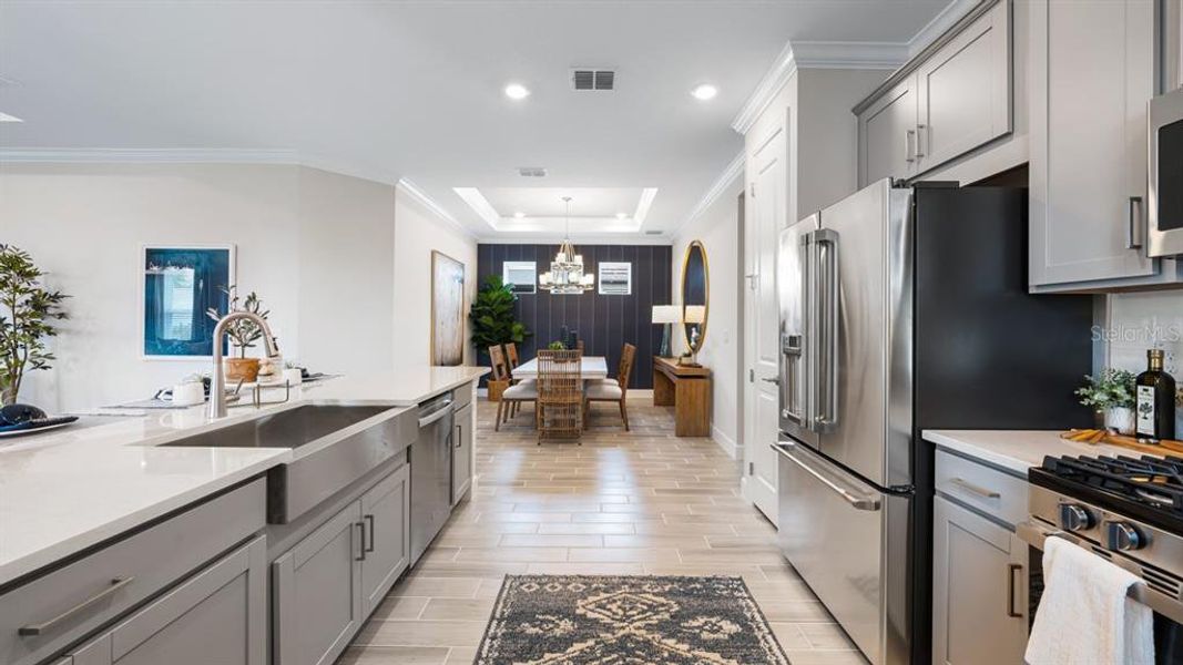 Furnished interior view inside a new home in Esplanade at Wiregrass Ranch, Wesley Chapel (Image 9).