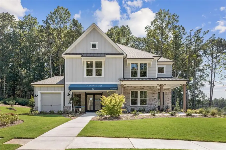 Front exterior of a new home in Ashbury Commons, Powder Springs, GA, highlighting curb appeal (Image 1). Front exterior of a new home in Ashbury Commons, Powder Springs, GA, highlighting curb appeal (Image 1).