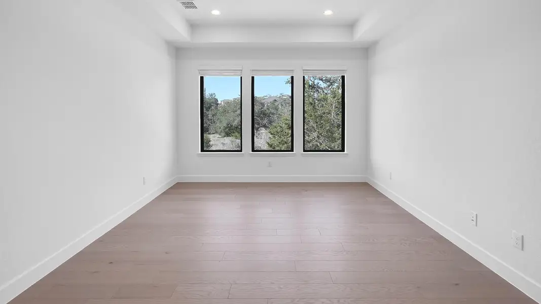 Representative unfurnished interior of a home built from the 3790A by Perry Homes in Bristol Valley, Rockwall (Image 14).