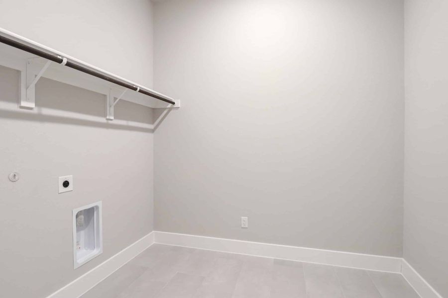 Representative furnished interior of a home built from the The Teton by Lillian Custom Homes in Polo Ridge, Heath (Image 16).