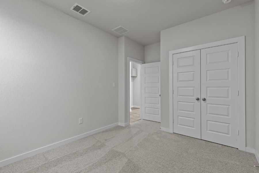 A room with white doors.