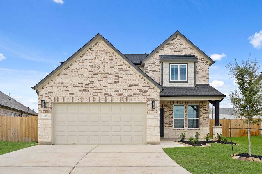 Front exterior of a new home in Morton Creek Ranch, Katy, TX, highlighting curb appeal (Image 1).