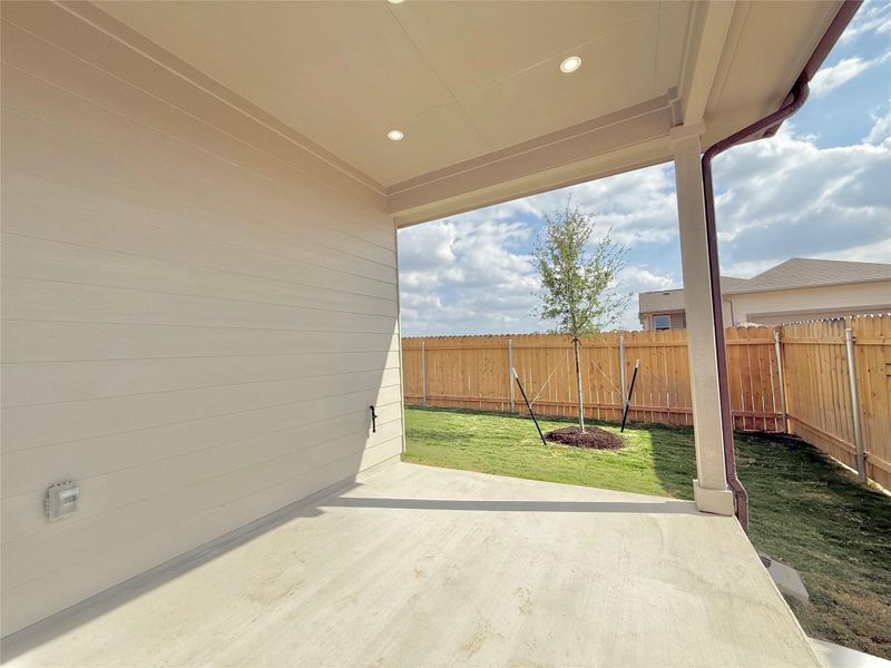 Exterior details and patio area of a home in Porter Country, Buda (Image 2). Exterior details and patio area of a home in Porter Country, Buda (Image 2).