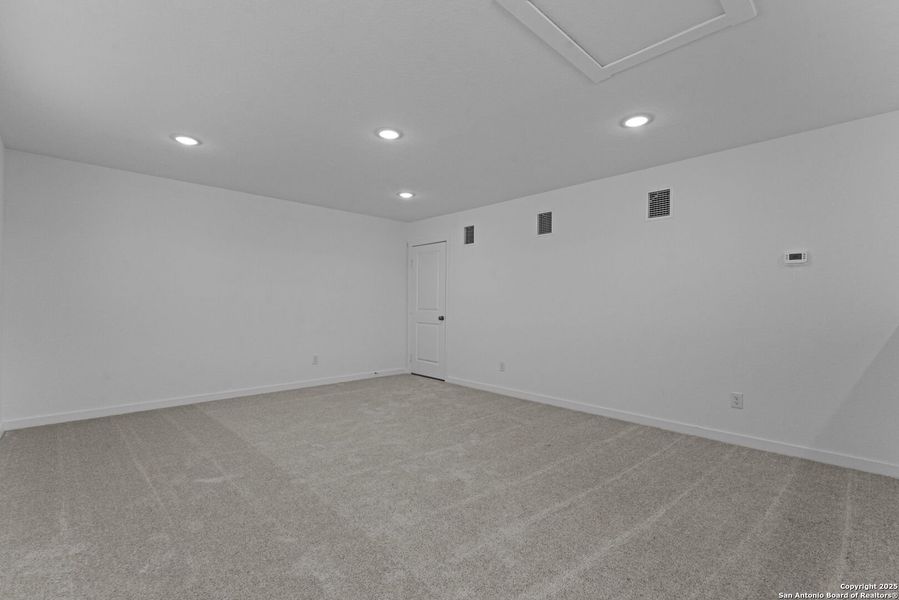 Spacious, unfurnished interior of a new home in Waterwheel: Coastline Collection, San Antonio (Image 12).