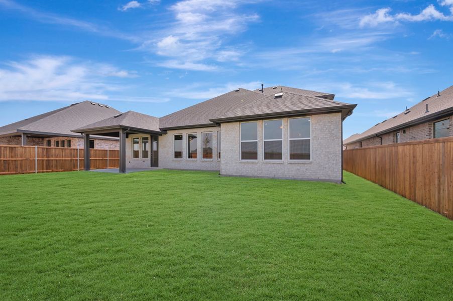 Exterior details and patio area of a home in LaPrelle, Haslet (Image 16). Exterior details and patio area of a home in LaPrelle, Haslet (Image 16).
