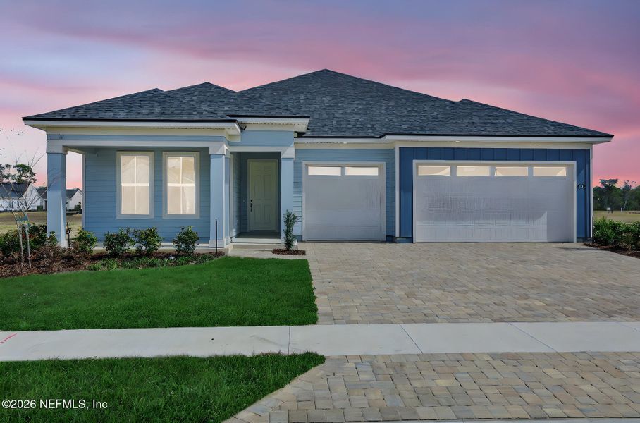 Front exterior of a new home in Veranda Bay, Flagler Beach, FL, highlighting curb appeal (Image 23).