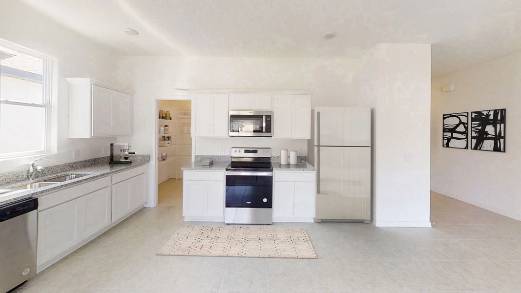 Representative furnished interior of a home built from the Polaris by Starlight Homes in Hawks Run, Kissimmee (Image 3).