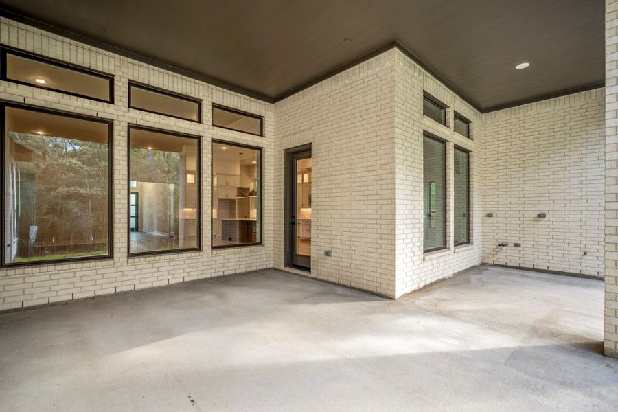 Exterior details and patio area of a home in The Woodlands Hills, Willis (Image 30). Exterior details and patio area of a home in The Woodlands Hills, Willis (Image 30).