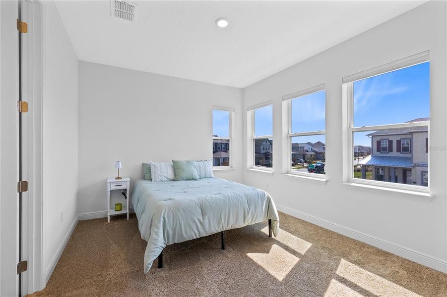 Furnished interior view inside a new home in Laureate Park, Orlando (Image 31).