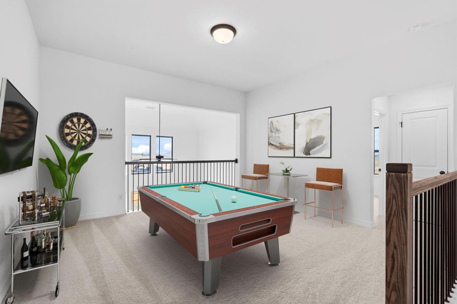 Spacious upstairs game room—perfect for entertaining, play, or relaxing with family.