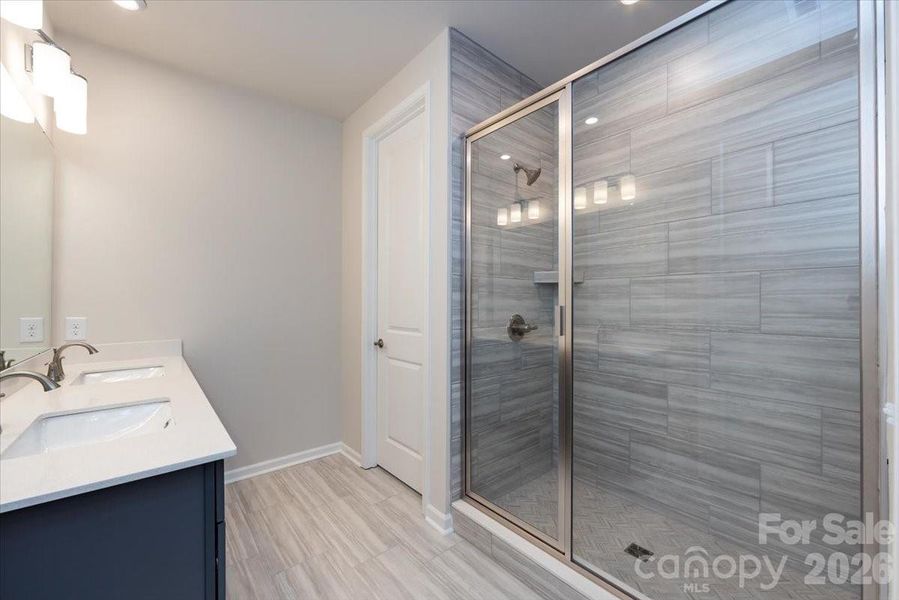 Primary Bathroom with tiled walk-in shower