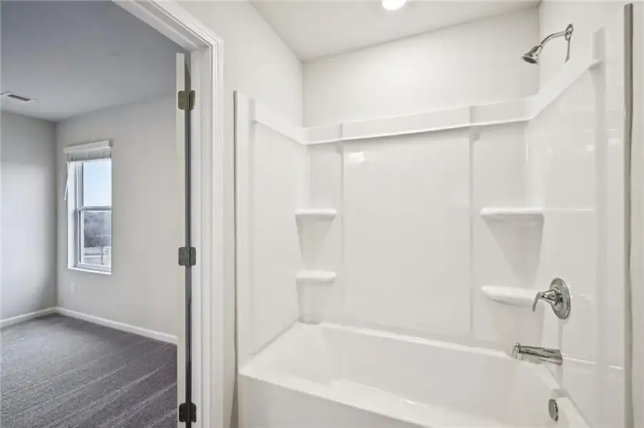 Furnished interior view inside a new home in The Hills at Cedar Creek, Winder (Image 29).