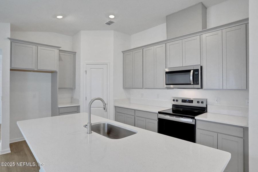 Furnished interior view inside a new home in Amberly, Green Cove Springs (Image 8).