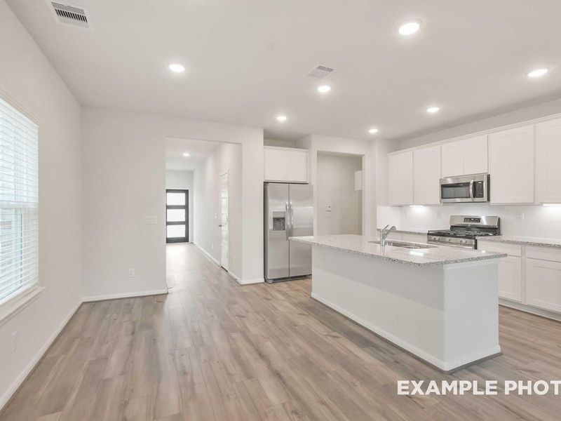 Furnished interior view inside a new home in Caney Creek Place, Conroe (Image 8).