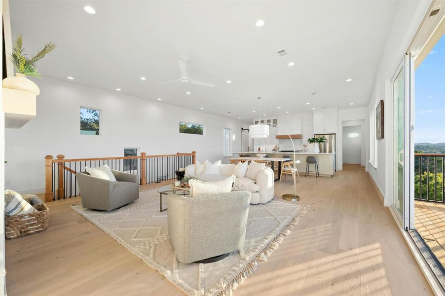 The luminous open great room floor plan makes it easy to stay connected with friends and family throughout the main living area.