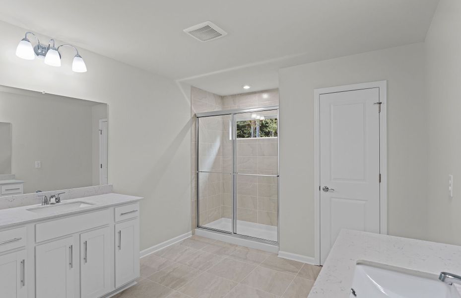 Furnished interior view inside a new home in Ansley Towns, Cumming (Image 11).