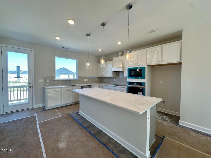 In-progress construction of a new home in Forestville Yard Townhomes, Knightdale, NC (Image 11).
