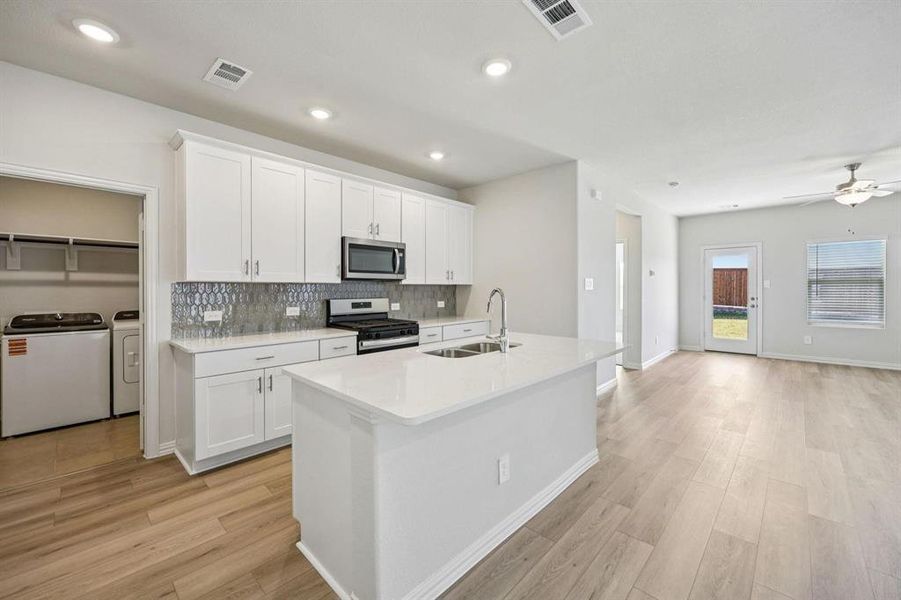 Furnished interior view inside a new home in Lakehaven - Spring Series, Farmersville (Image 12).