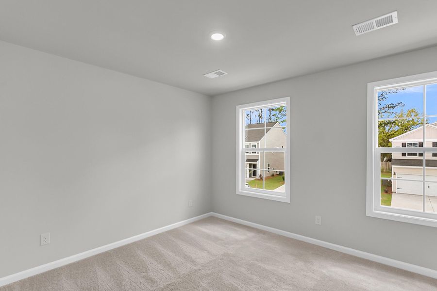 Spacious, unfurnished interior of a new home in Central Creek, Goose Creek (Image 23).