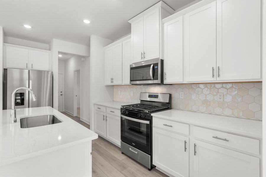 Furnished interior view inside a new home in Cypress Ridge - The Boardwalk Series, Longs (Image 7).