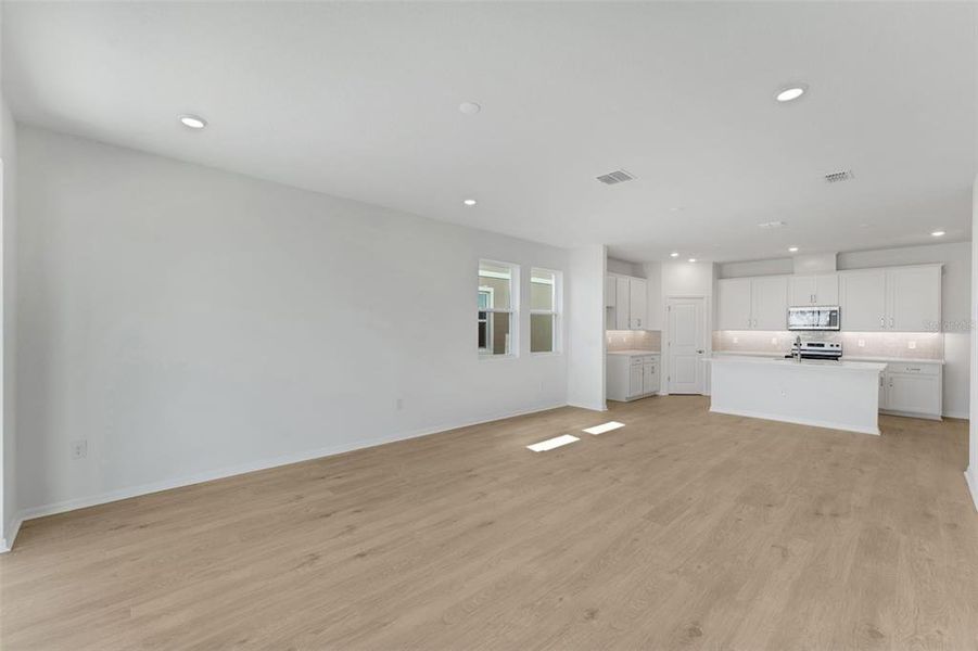 Spacious, unfurnished interior of a new home in Seaire, Parrish (Image 41).