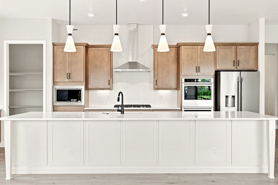 Furnished interior view inside a new home in Hilltop at Inspiration, Aurora (Image 7).