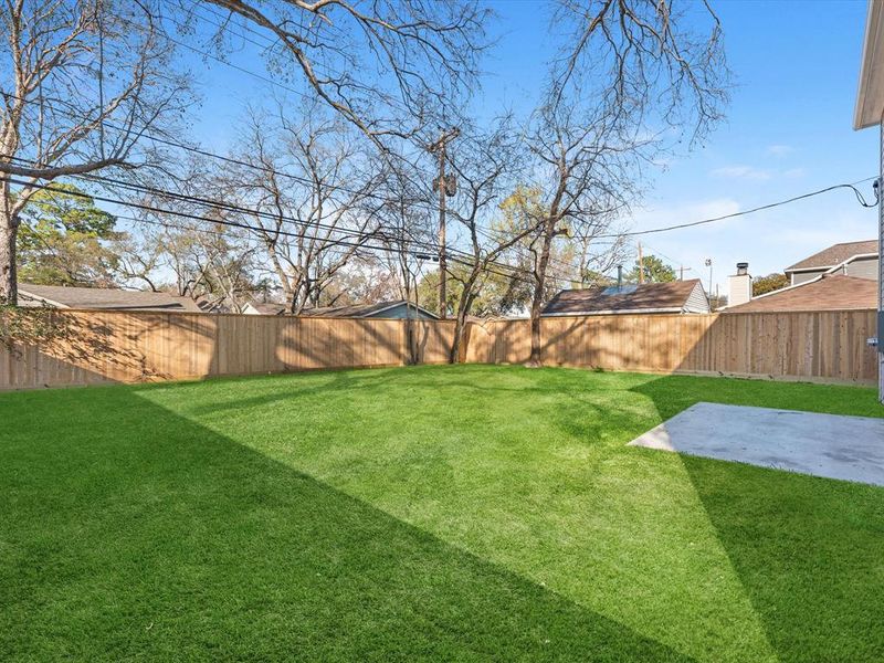 cedar fence enclosing backyard