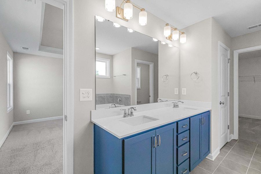 Representative furnished interior of a home built from the Aberdeen by Caviness & Cates Communities in Bartlett Manor, Youngsville (Image 184).
