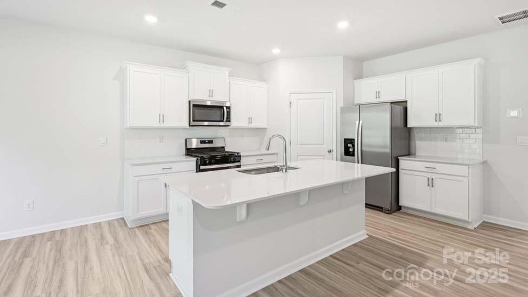 Furnished interior view inside a new home in Wallace Springs, Statesville (Image 3).